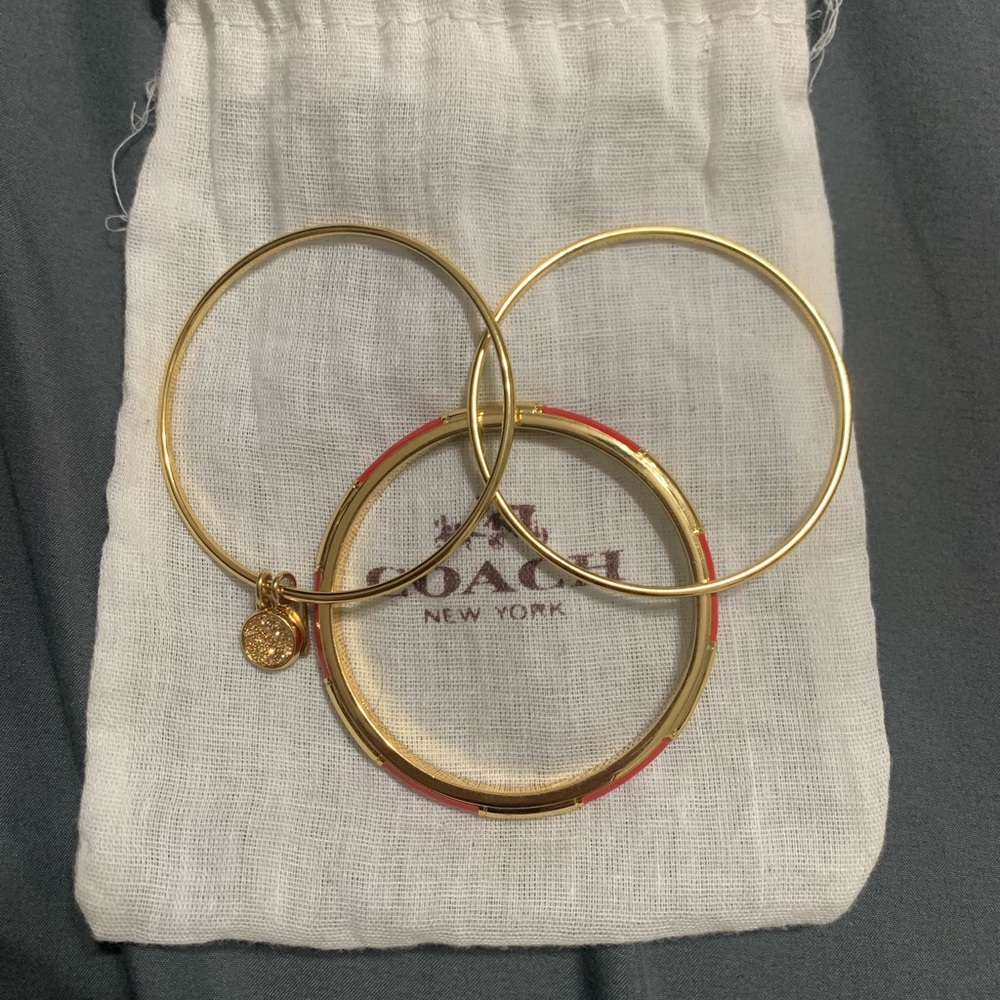 COACH gold bangles